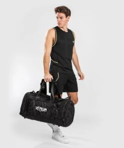 Venum Sports Bag Trainer Lite - Black/camo -Fighters Europe Shop 3c4820dcfb45ee27f675630f46f233ab826c6be3 SPORT BAG TRAINER LITE BLACK DARKCAMO 13